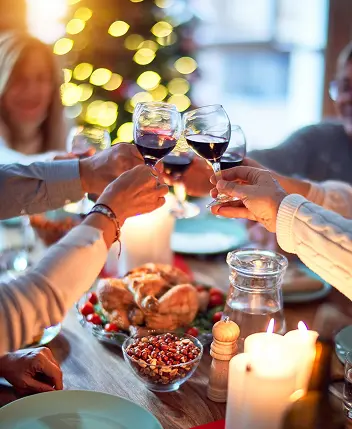 Guests toasting wine glasses