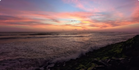 Vibrant Goan festival celebration with sunset backdrop