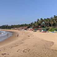 Sinquerim Beach dramatic sunset with red cliffs